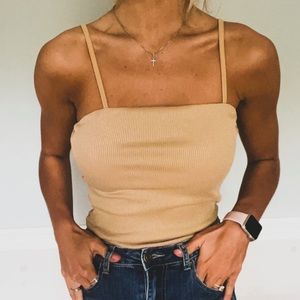 Gold/Sand colored body suit.